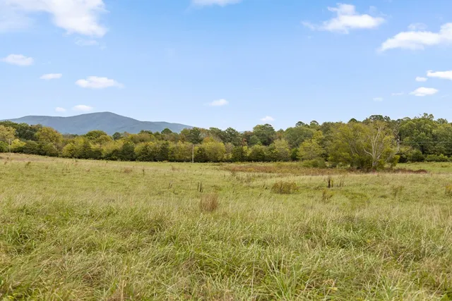 a view of lake and mountain