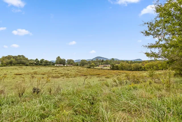 a view of lake and mountain