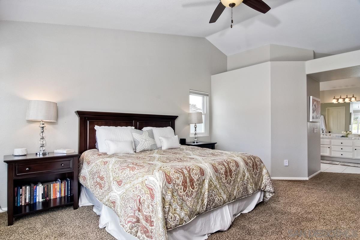 1754 Orchard Wood Road Encinitas, CA 92024 - Photo 19 of 25 2 separate closets w custom CA closet built-ins.