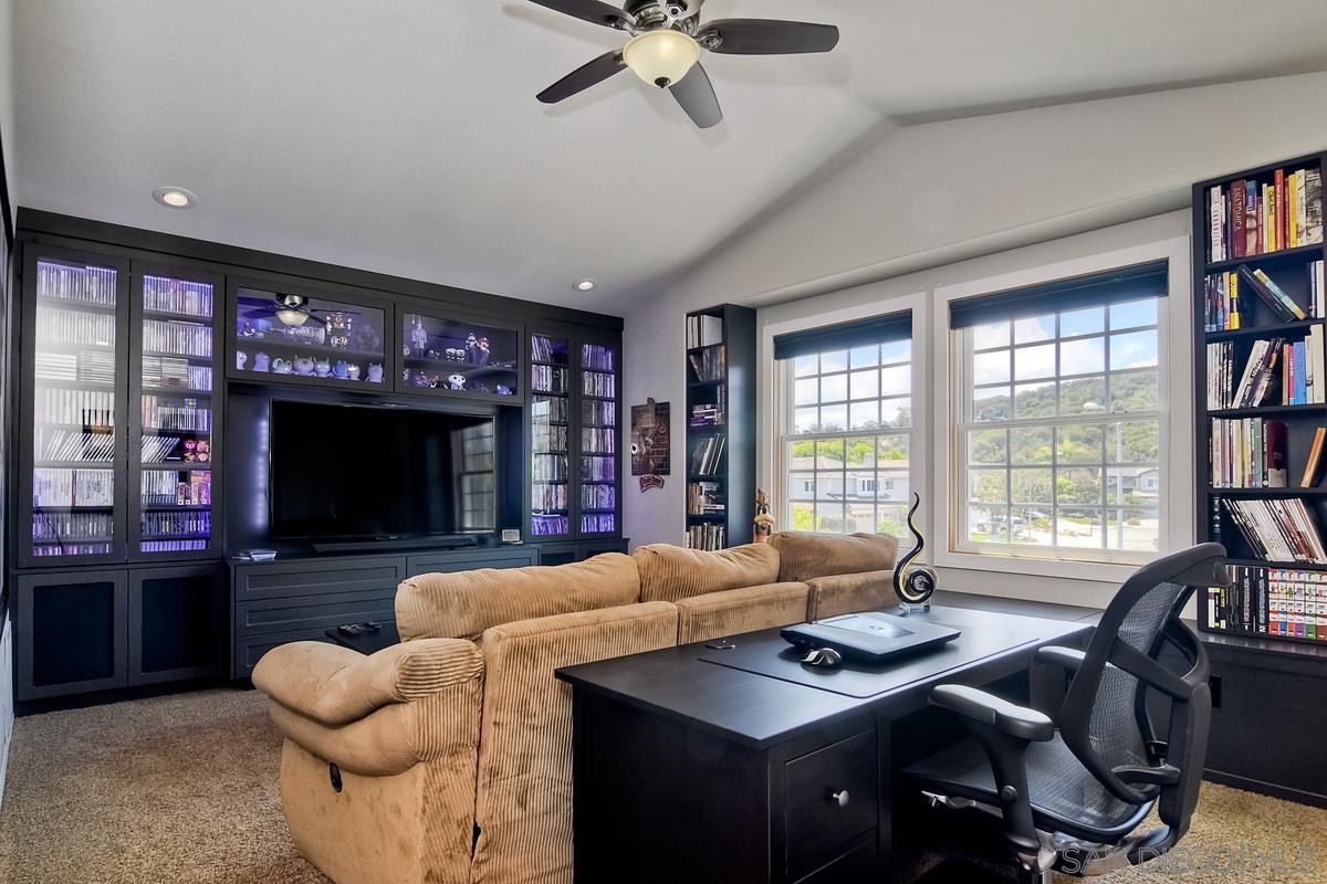 1754 Orchard Wood Road Encinitas, CA 92024 - Photo 20 of 25 Custom Entertainment built-ins from floor to ceiling just completed. Window seat with storage.
