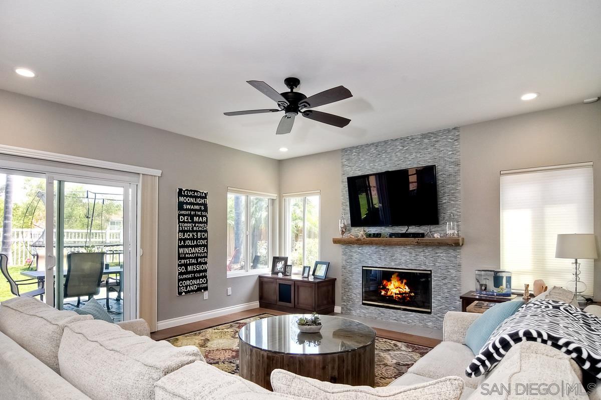 1754 Orchard Wood Road Encinitas, CA 92024 - Photo 8 of 25 Custom fireplace and mantle & built-ins added