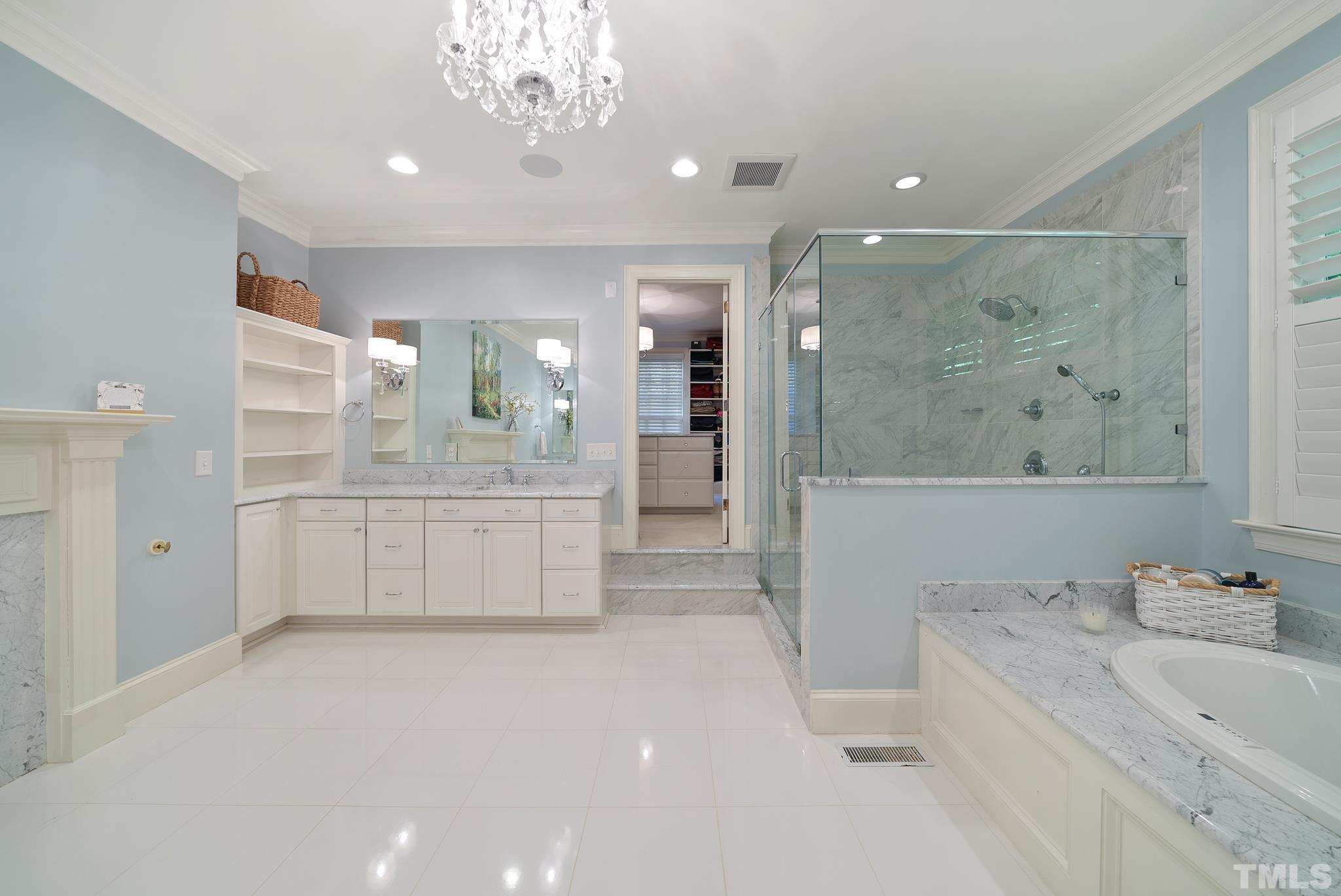 204 Queensferry Road Cary, NC 27511 - Photo 14 of 41 a bathroom with a double vanity sink mirror and bathtub