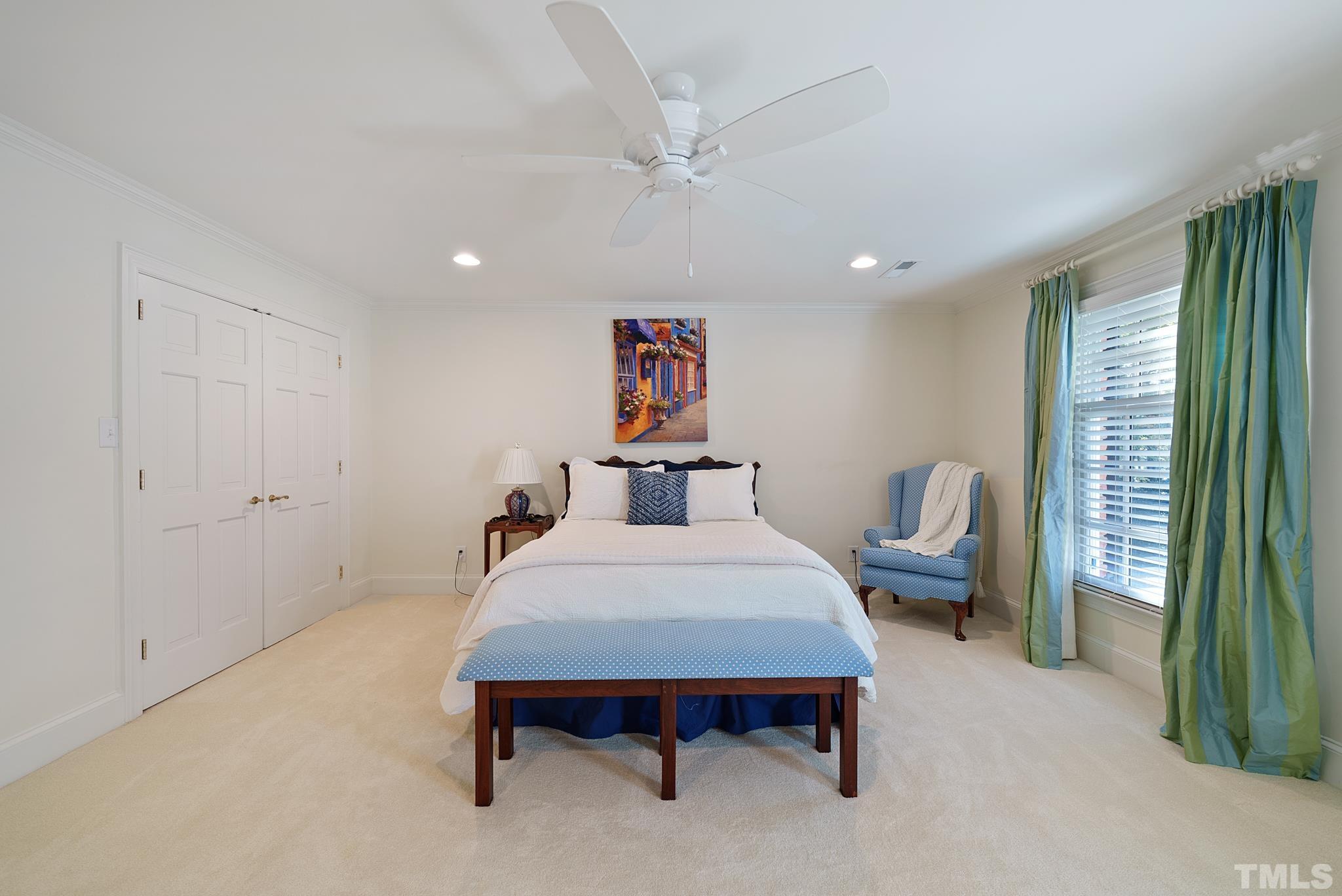 204 Queensferry Road Cary, NC 27511 - Photo 18 of 41 a bed room with furniture and a large window