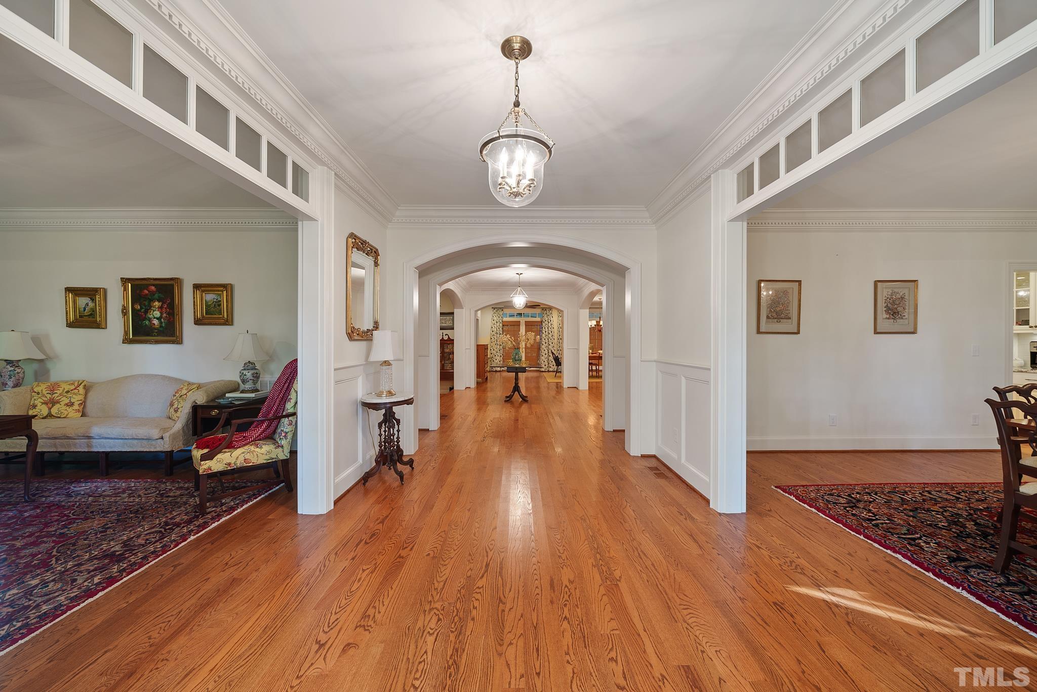 204 Queensferry Road Cary, NC 27511 - Photo 3 of 41 a view of a livingroom with wooden floor