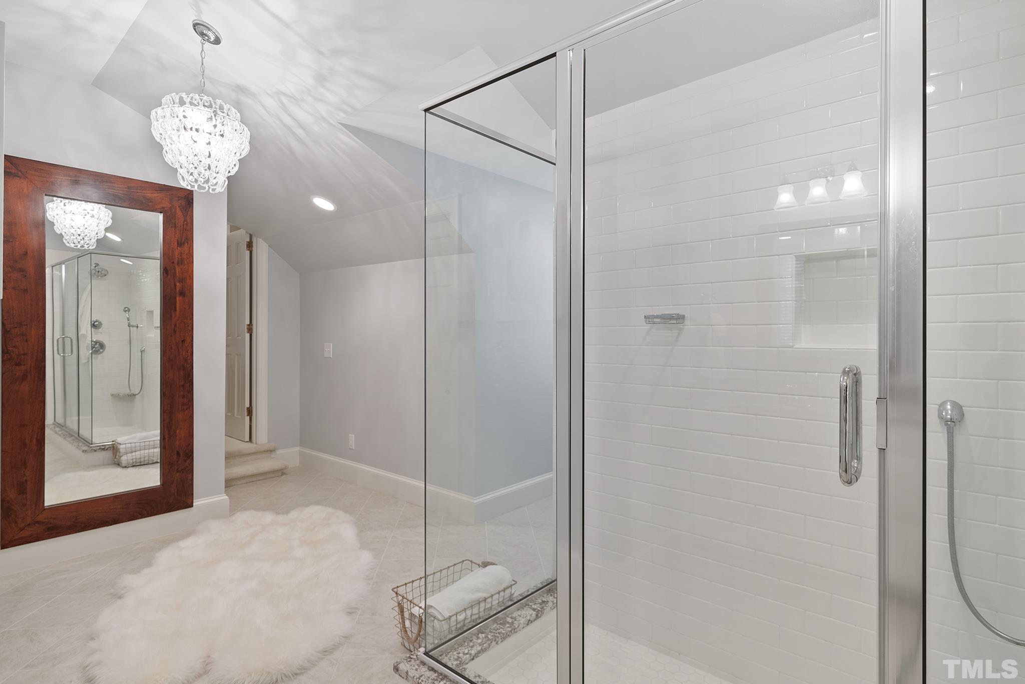 204 Queensferry Road Cary, NC 27511 - Photo 23 of 41 a bathroom with a shower a mirror and a shower