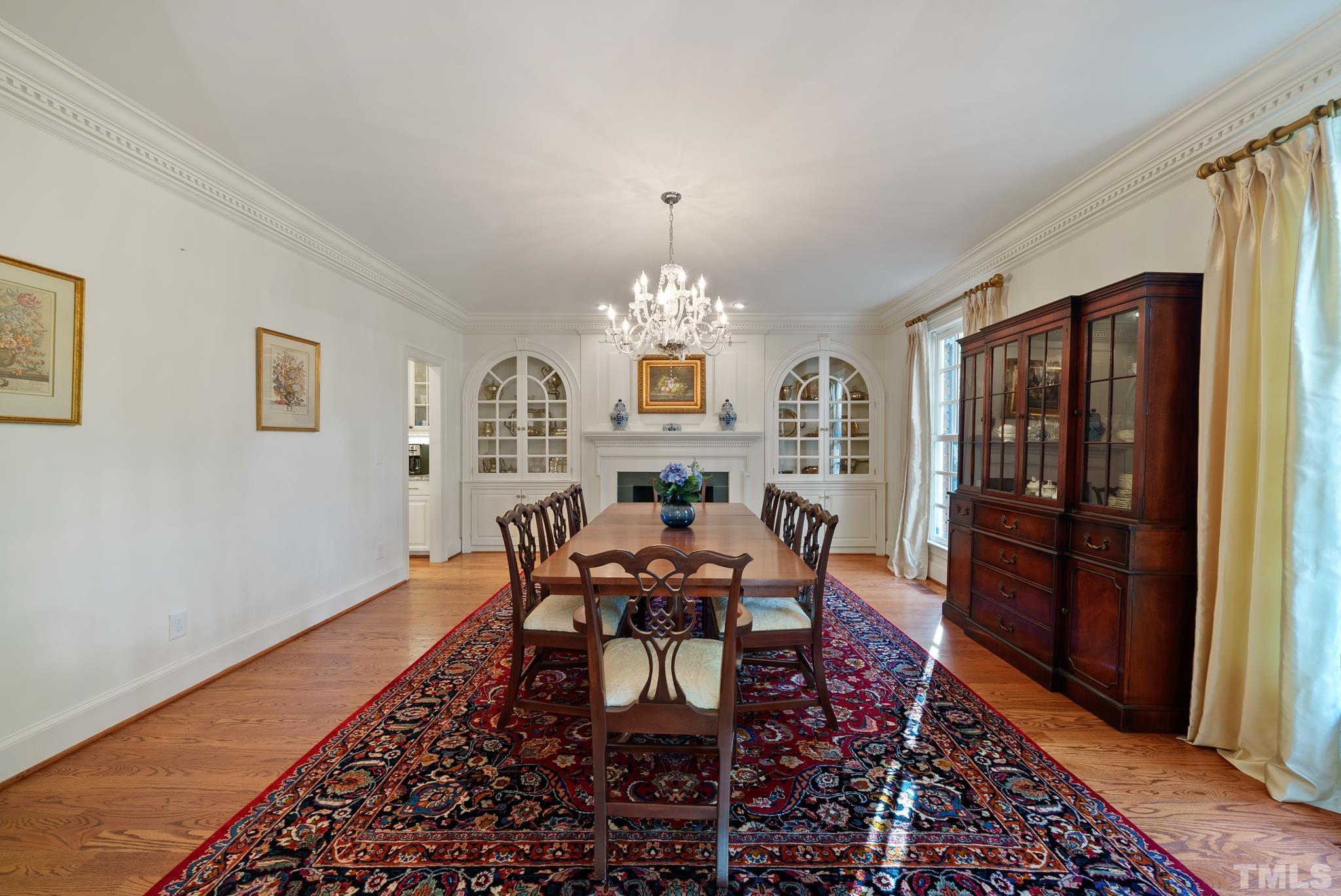204 Queensferry Road Cary, NC 27511 - Photo 4 of 41 a view of a dining room with furniture window and wooden floor