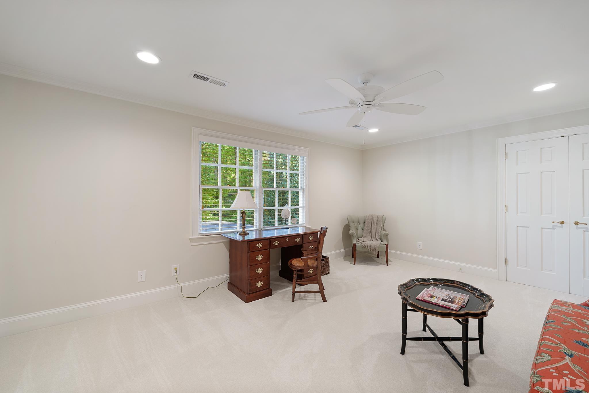 204 Queensferry Road Cary, NC 27511 - Photo 35 of 41 a workspace with furniture and a window