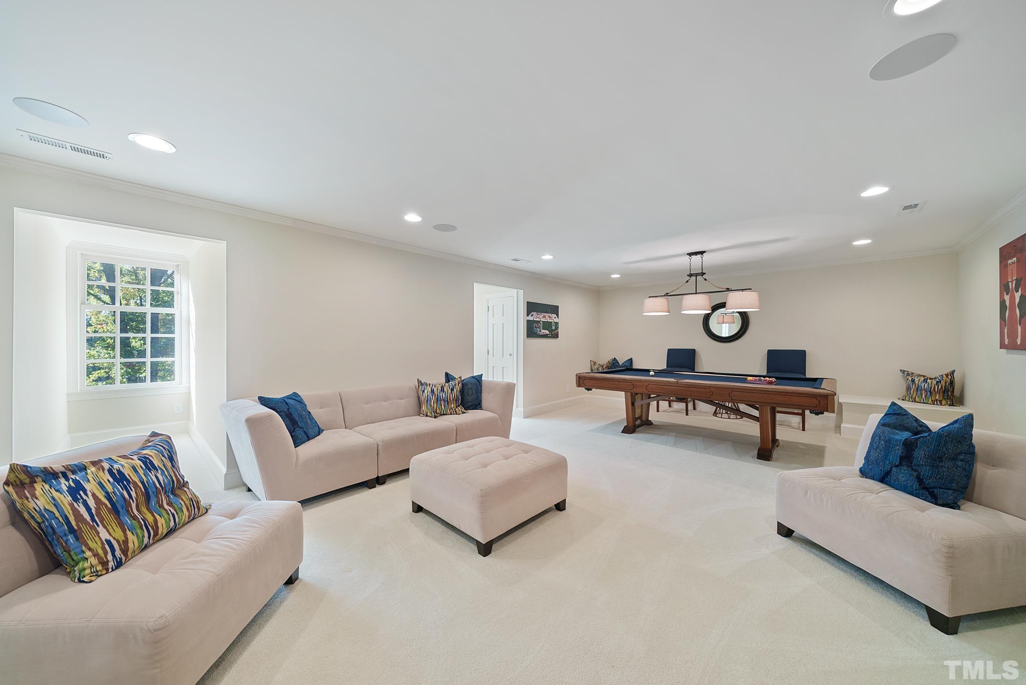 204 Queensferry Road Cary, NC 27511 - Photo 36 of 41 a living room with furniture and a window