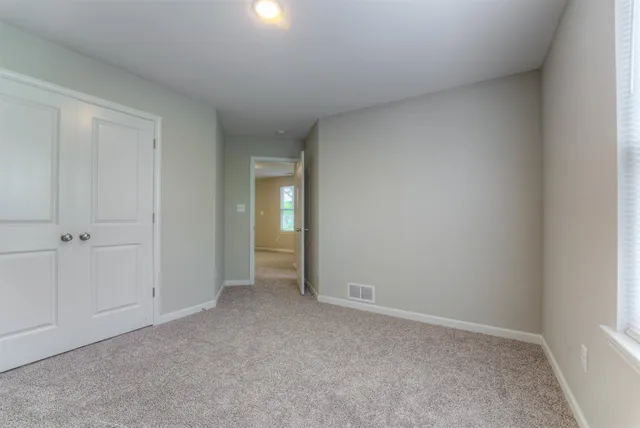 an empty room with an entryway