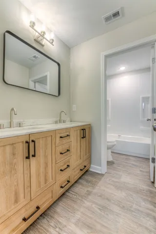 a view of a room with a large window