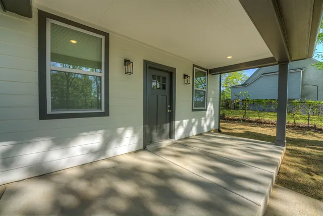 a front view of a house with a porch