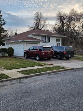 a car parked in front of a house