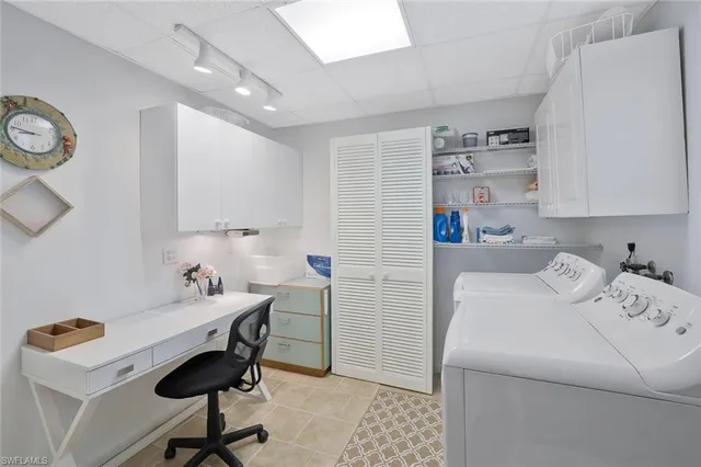 a room that has a couch and a chair in it