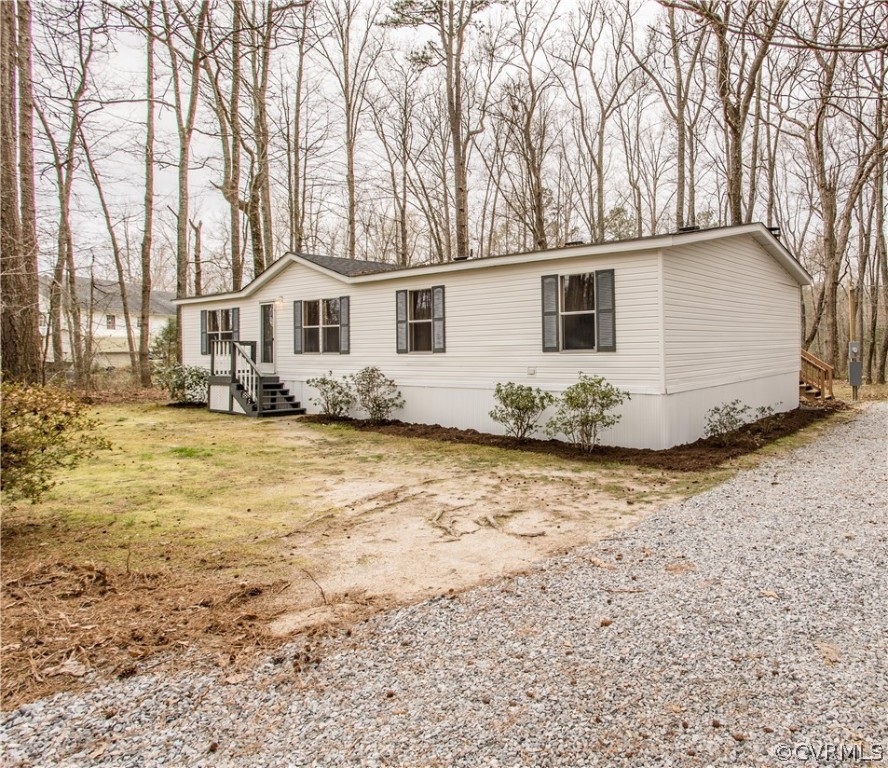 17208 Hamilton Arms Road Dewitt, VA 23840 - Photo 13 of 14 a view of a house with a yard