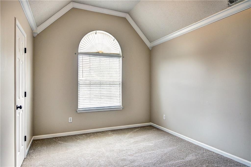 2415 Marsh Rabbit Bend Decatur, GA 30035 - Photo 16 of 18 an empty room with a window