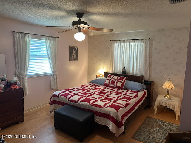 951 Grace Terrace Jacksonville, FL 32205 - Photo 5 of 5 a bedroom with a bed and window