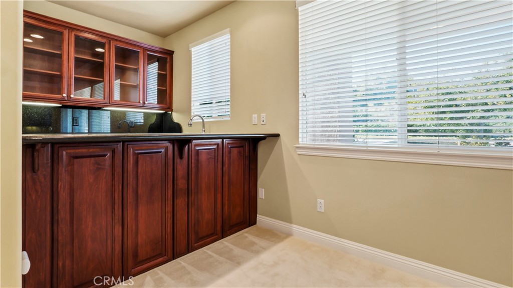 18549 Clydesdale Road Granada Hills, CA 91344 - Photo 23 of 56 a view of a window and a wooden door