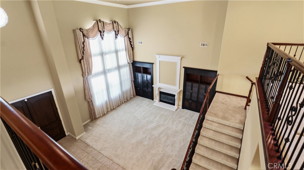 18549 Clydesdale Road Granada Hills, CA 91344 - Photo 29 of 56 a view of a living room with furniture and a flat screen tv