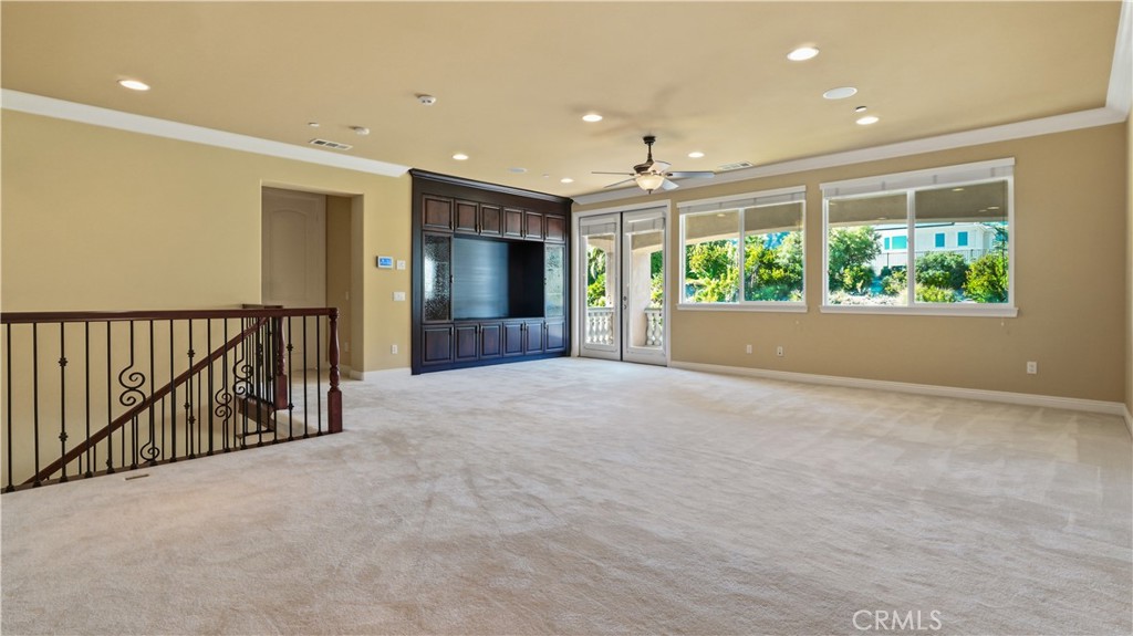 18549 Clydesdale Road Granada Hills, CA 91344 - Photo 31 of 56 a view of hallway with wooden floor and windows