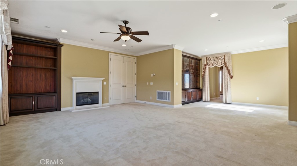 18549 Clydesdale Road Granada Hills, CA 91344 - Photo 36 of 56 a view of an empty room with a fireplace