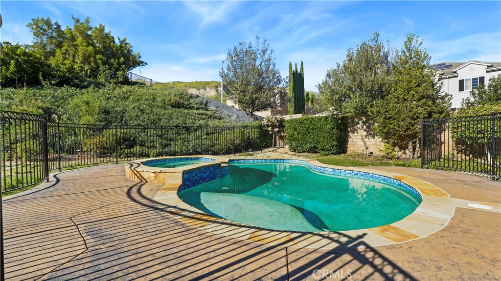 18549 Clydesdale Road Granada Hills, CA 91344 - Photo 50 of 56 a view of a swimming pool with a patio