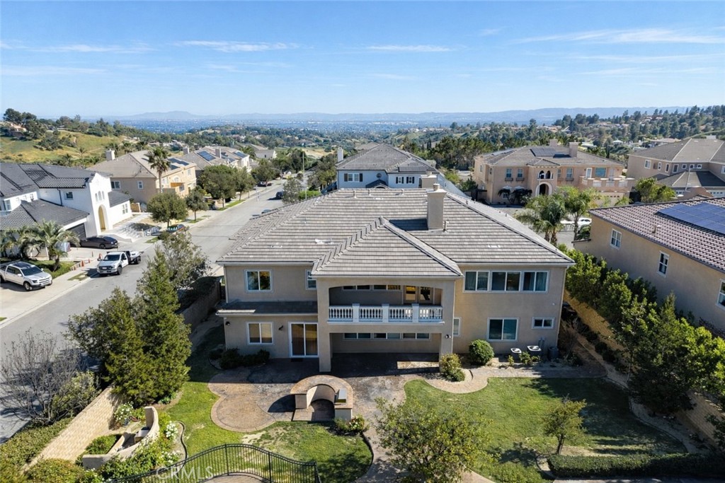 18549 Clydesdale Road Granada Hills, CA 91344 - Photo 54 of 56 an aerial view of a house with swimming pool and a yard