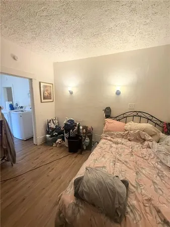 a bed room with a bed and a couch
