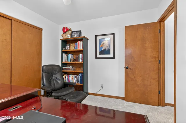 a workspace with a bookshelf
