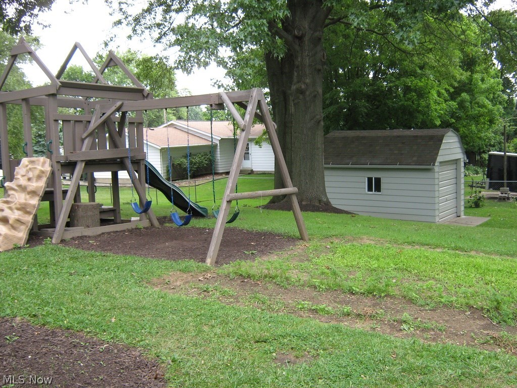 4625 Roop Avenue Barberton, OH 44203 - Photo 2 of 18 Large Fenced Back Yard with Extra Large storage Barn
