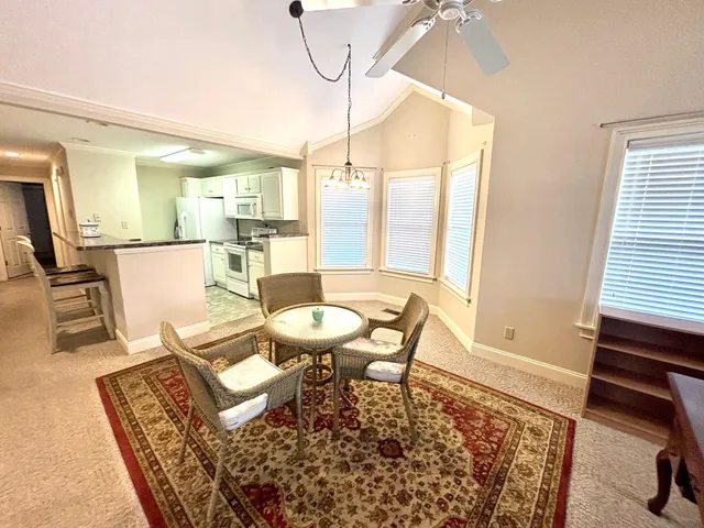 a living room with a couch and a table