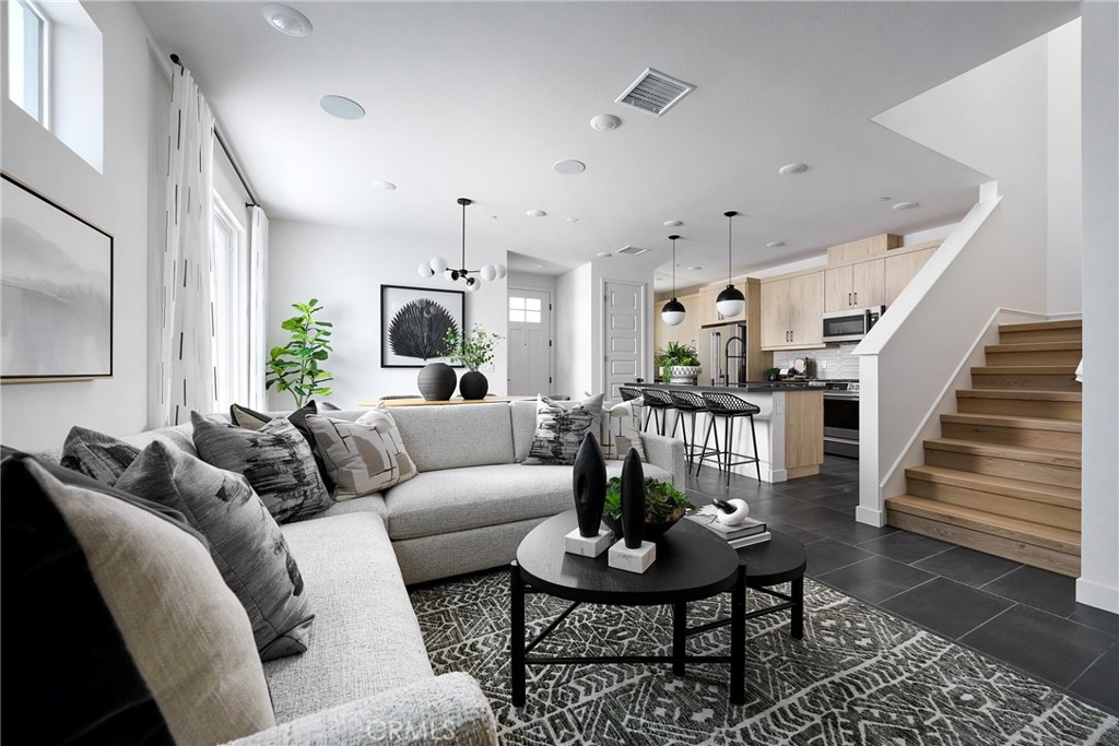 1733 Scarlett Road Rancho Mission Viejo, CA 92694 - Photo 1 of 11 Model Photos: Photos shown are of the model home for this floor plan. Actual finishes, features, and landscaping may vary.