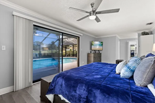 a bed room with a bed and a night stand