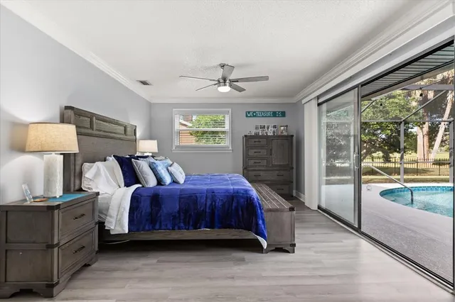 a bed room with a bed and a window