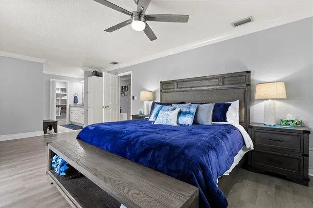 a bathroom with a granite countertop double vanity sinks and a mirror