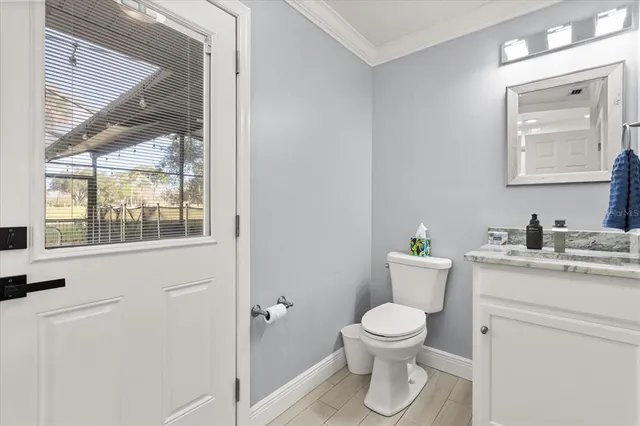 a bathroom with a shower and a sink