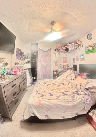 a bathroom with a sink toilet and a mirror