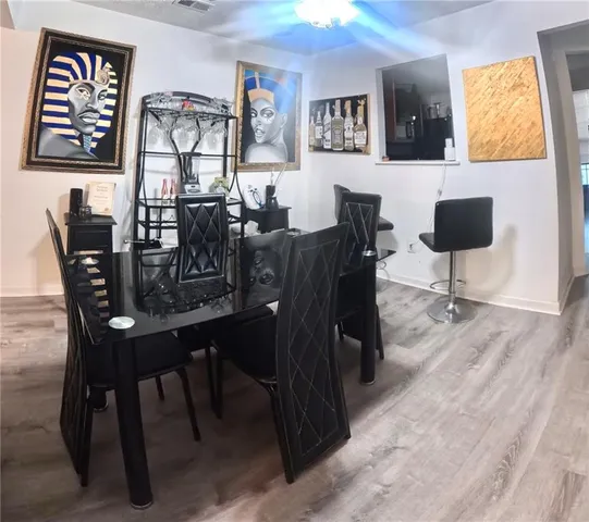 a view of a dining room with furniture