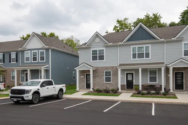 a car parked in front of a house