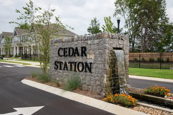 a view of a street with a building in the background