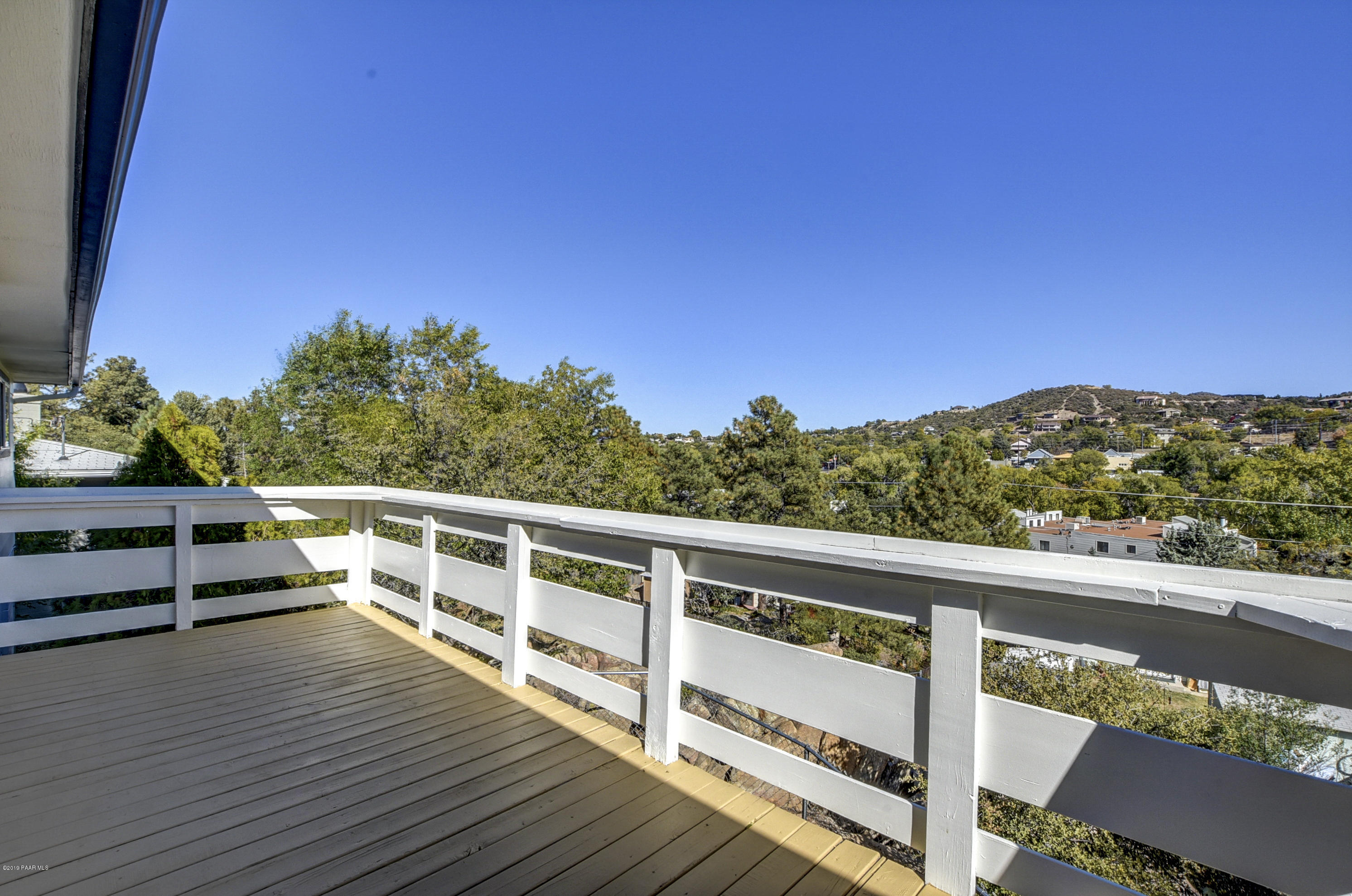 439 Canyon Springs Road Prescott, AZ 86303 - Photo 15 of 37 a view of a balcony with chairs