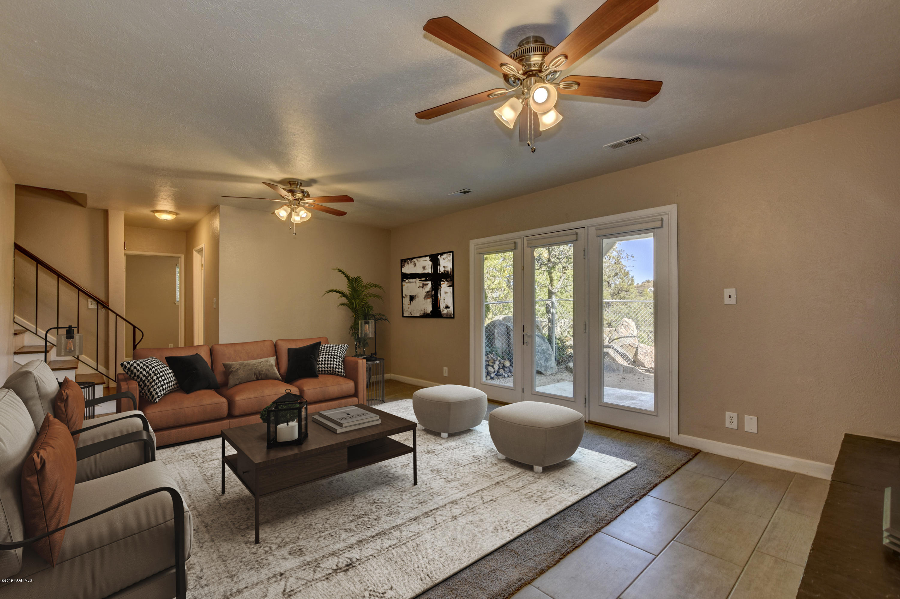 439 Canyon Springs Road Prescott, AZ 86303 - Photo 24 of 37 a living room with furniture and a large window