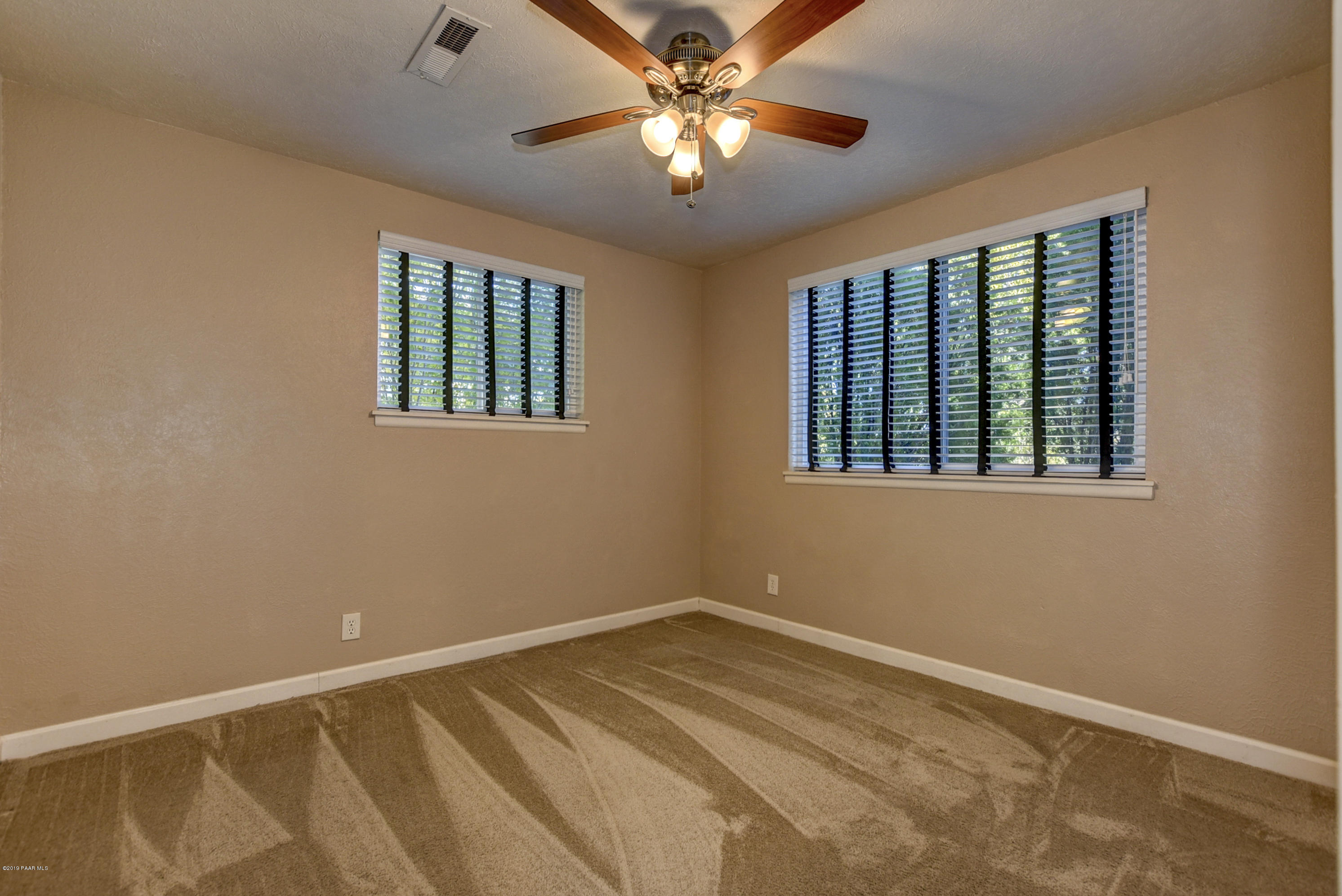 439 Canyon Springs Road Prescott, AZ 86303 - Photo 26 of 37 a view of an empty room with a window
