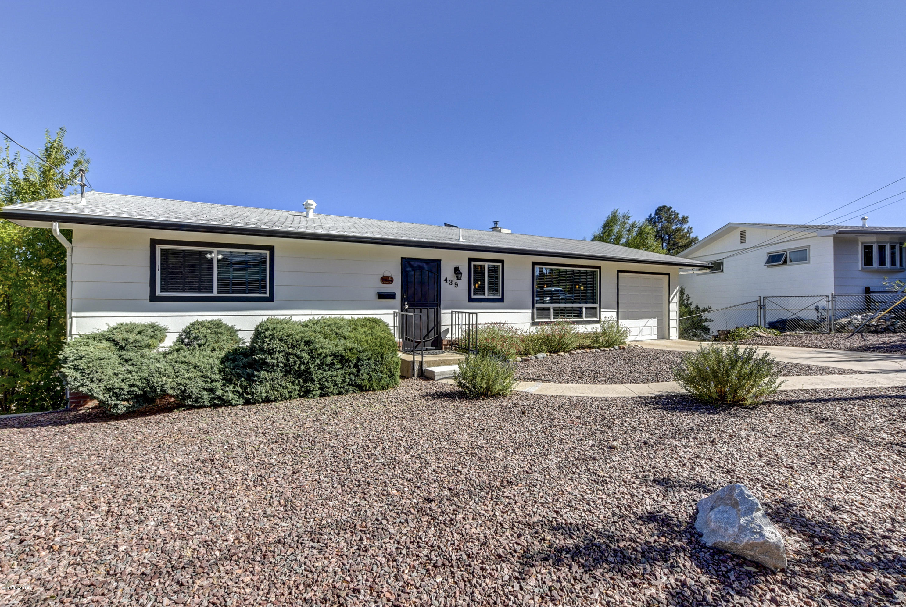 439 Canyon Springs Road Prescott, AZ 86303 - Photo 3 of 37 a view of a house with a patio