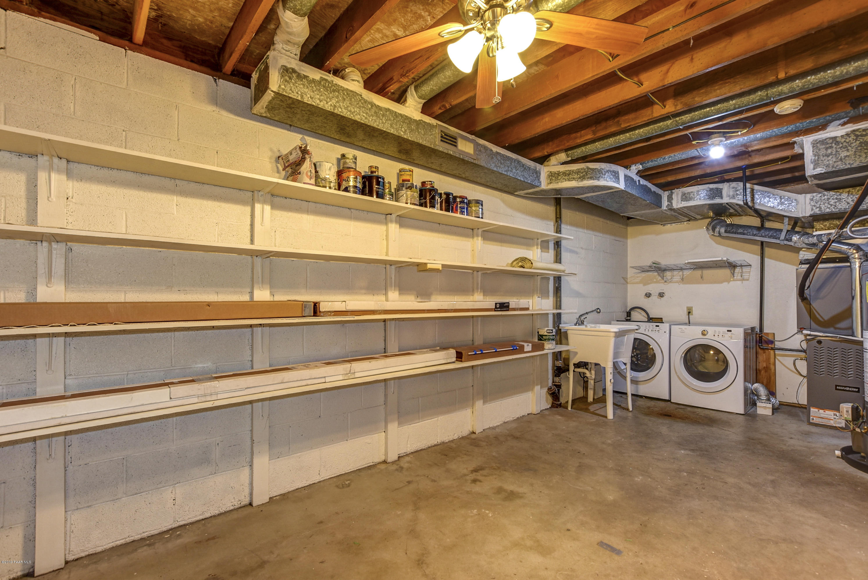 439 Canyon Springs Road Prescott, AZ 86303 - Photo 33 of 37 a view of a storage & utility room with washer and dryer
