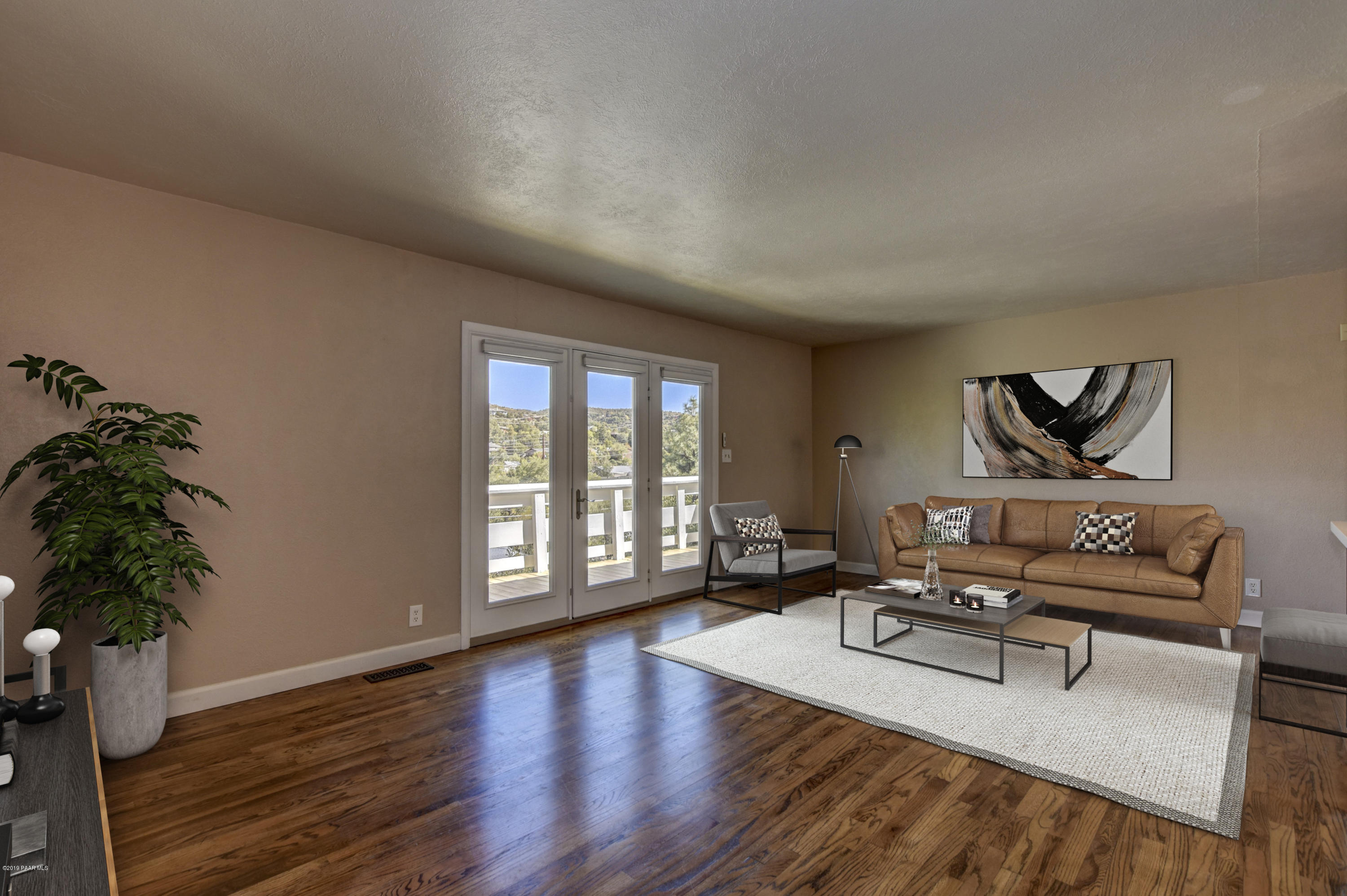 439 Canyon Springs Road Prescott, AZ 86303 - Photo 4 of 37 a living room with furniture and a large window