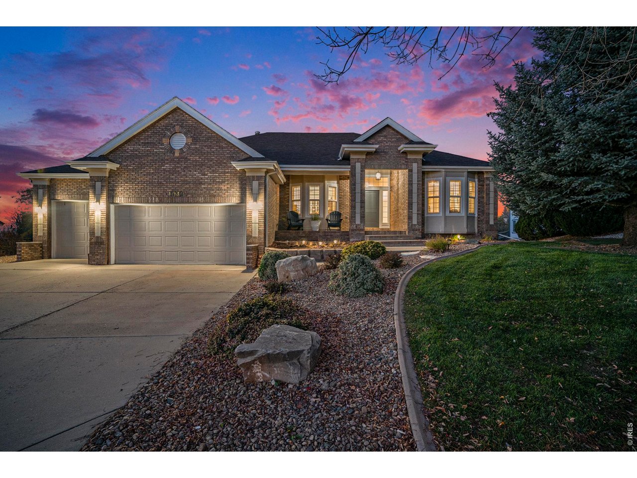 1049 Ridge W Drive Windsor, CO 80550 - Photo 1 of 46 Beatiful Curb Appeal in Ridge West