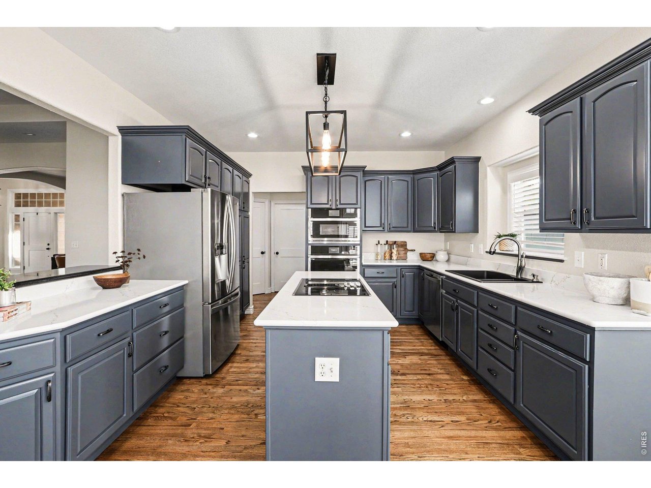 1049 Ridge W Drive Windsor, CO 80550 - Photo 14 of 46 Spacious Kitchen w/Island