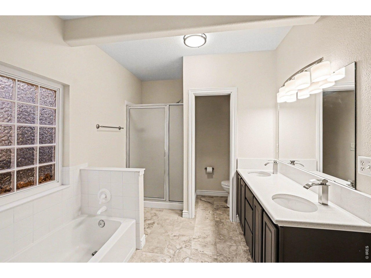 1049 Ridge W Drive Windsor, CO 80550 - Photo 34 of 46 5 Piece Bath in Walkout Basement