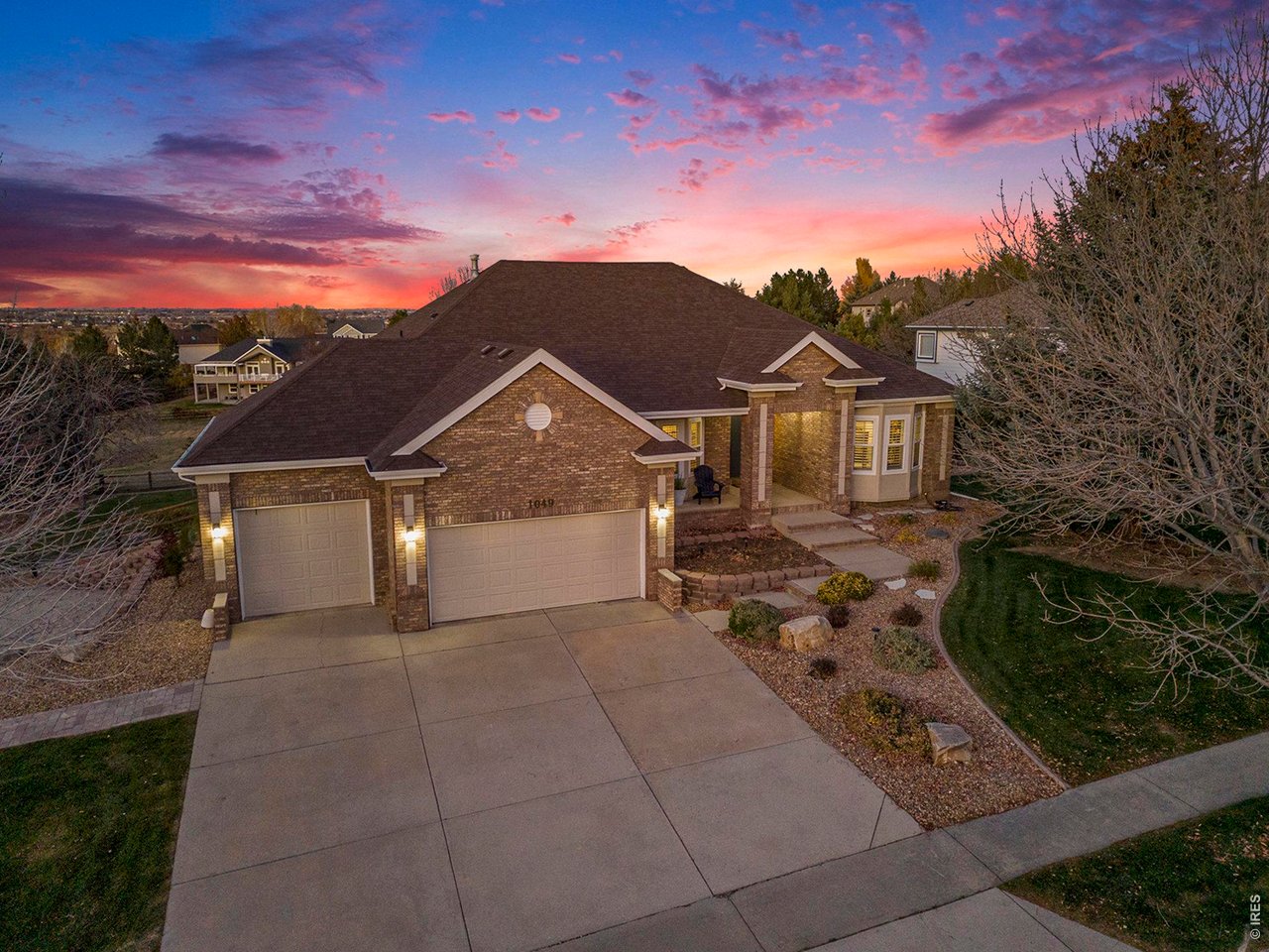 1049 Ridge W Drive Windsor, CO 80550 - Photo 4 of 46 3 car garage