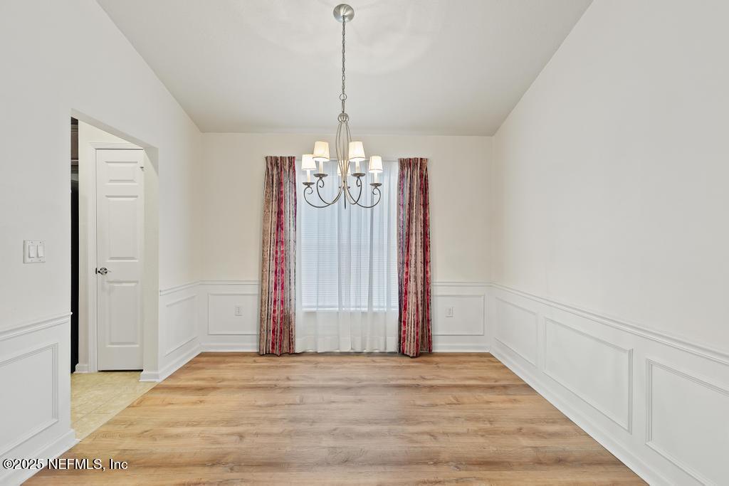 9080 Sweet Tree Trail Jacksonville, FL 32256 - Photo 27 of 44 a view of a chandelier in a room